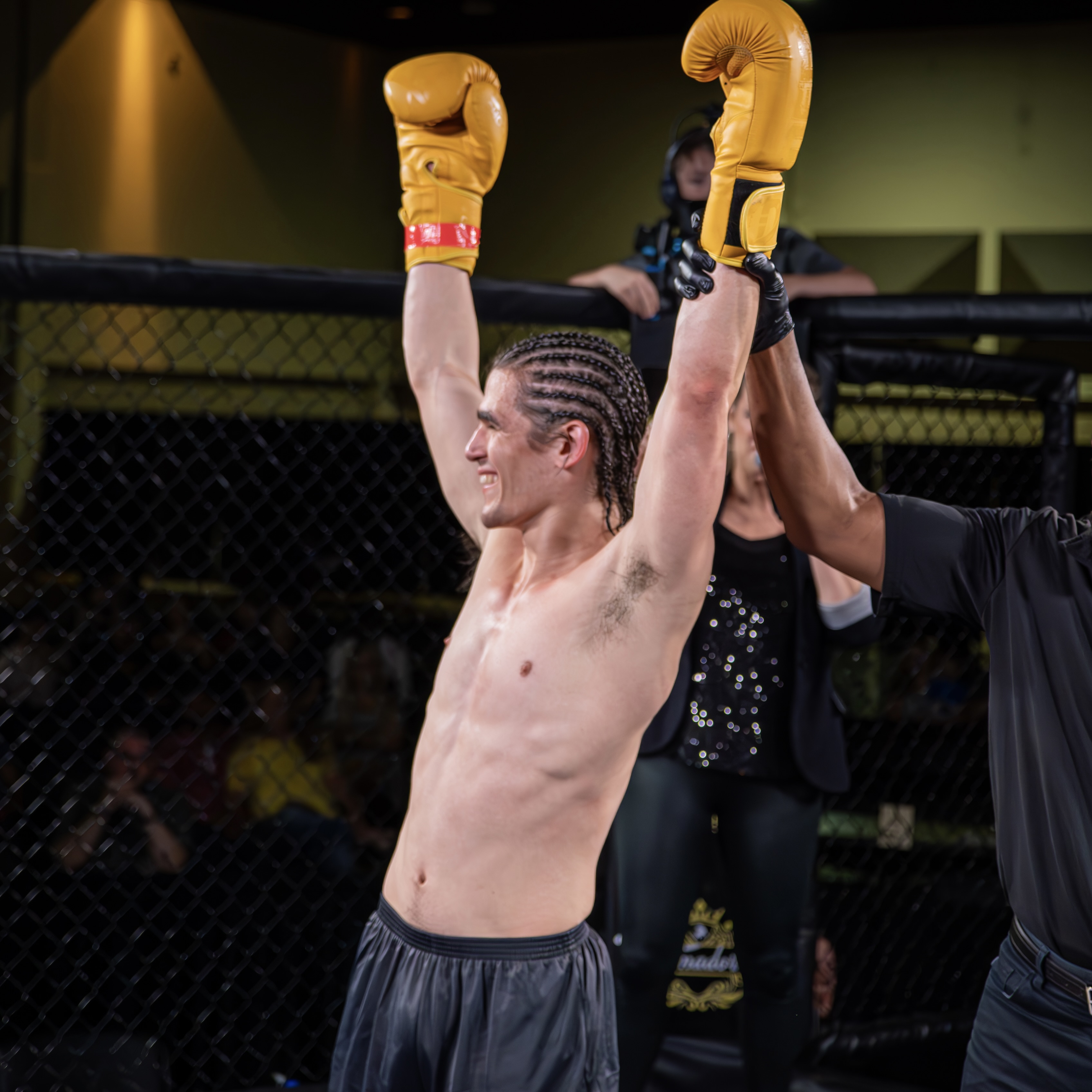 Dom's victory pose after kickboxing match.